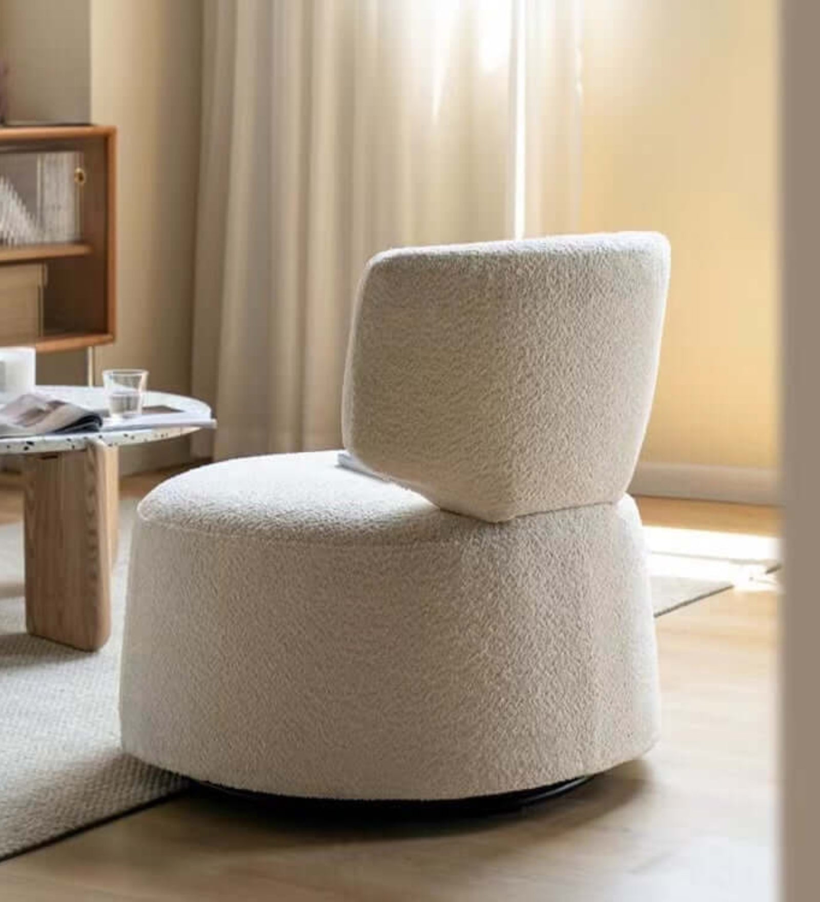 Frank Boucle Fabric Swivel Chair in Shell White Colour