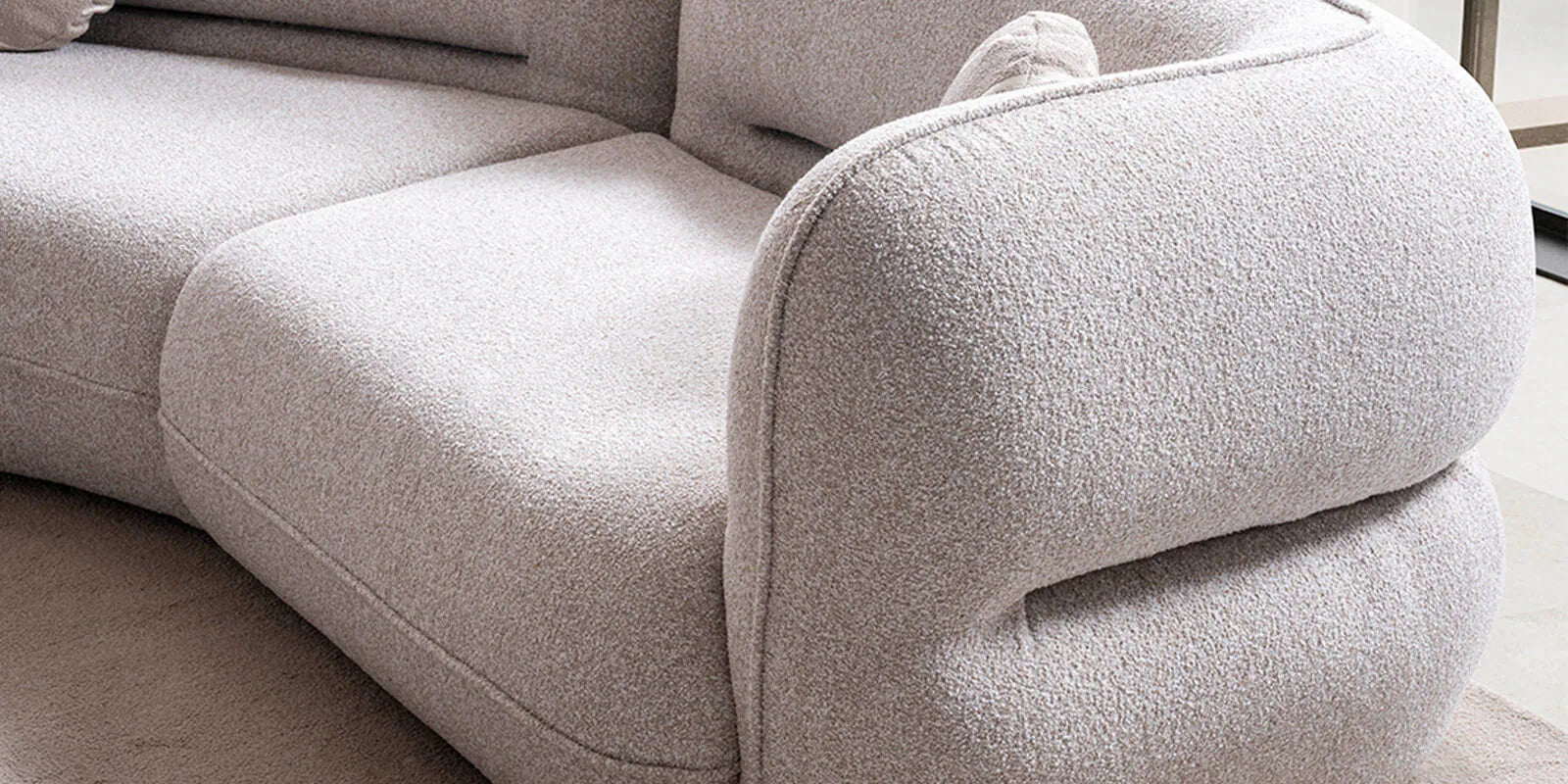 Madox Boucle Fabric 4 Seater Curved Sofa In Macy Grey Colour