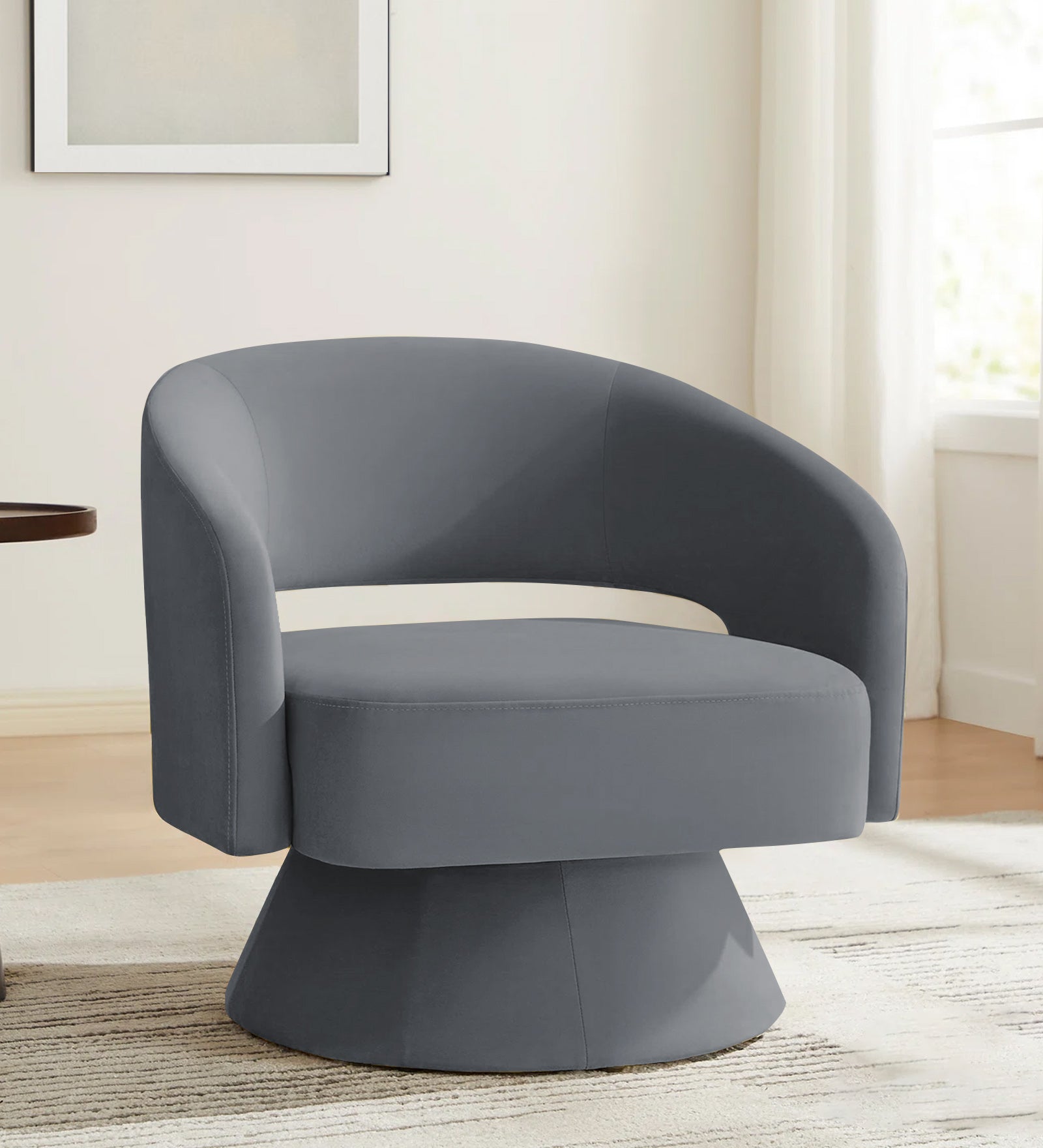 Pendra Velvet Swivel Chair in Pubble Grey Colour