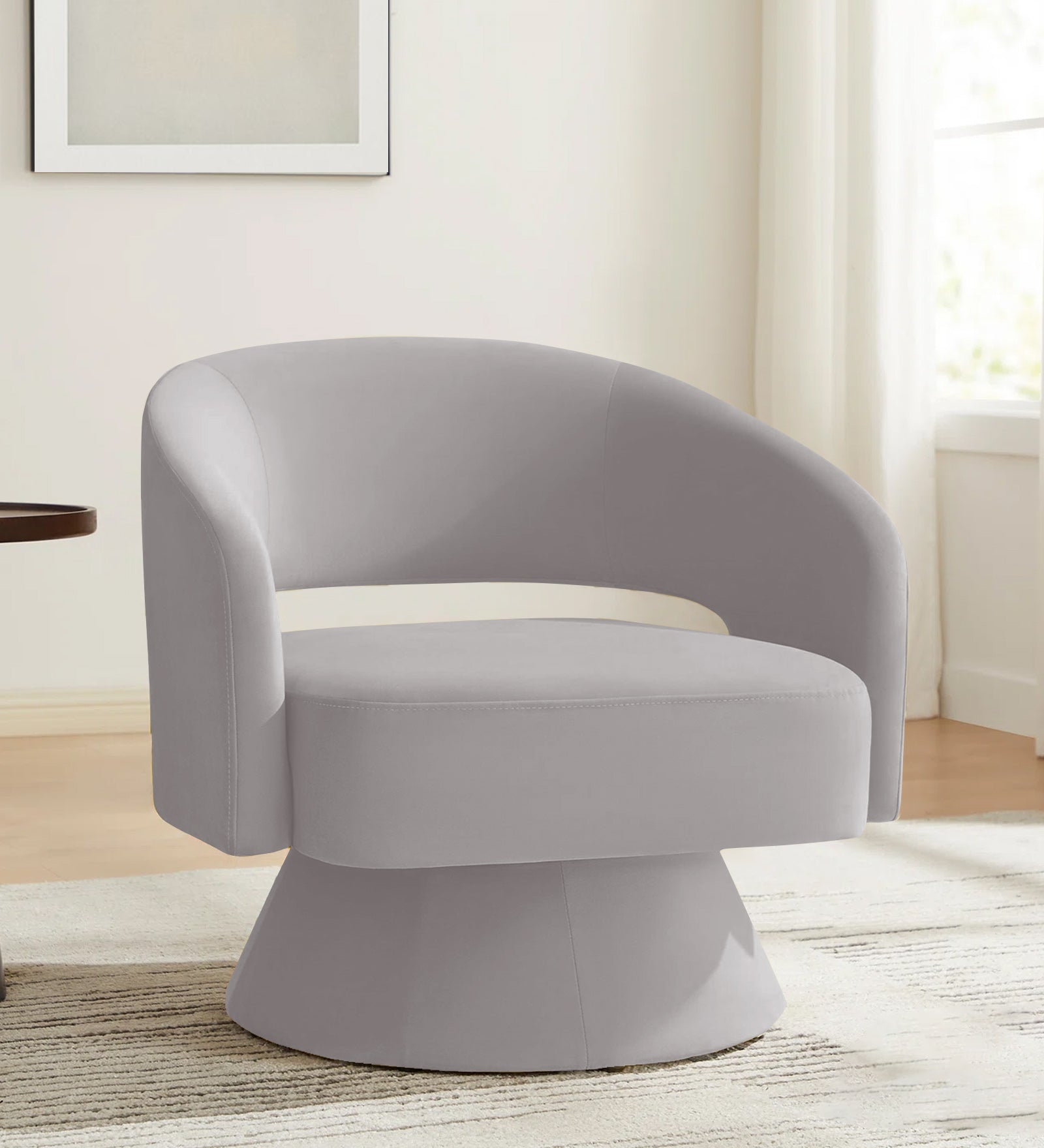 Pendra Velvet Swivel Chair in light grey Colour