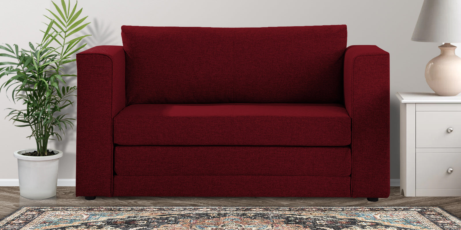 Kenia Fabric 2 Seater Convertible Sofa Cum Bed in Ruby Red Colour