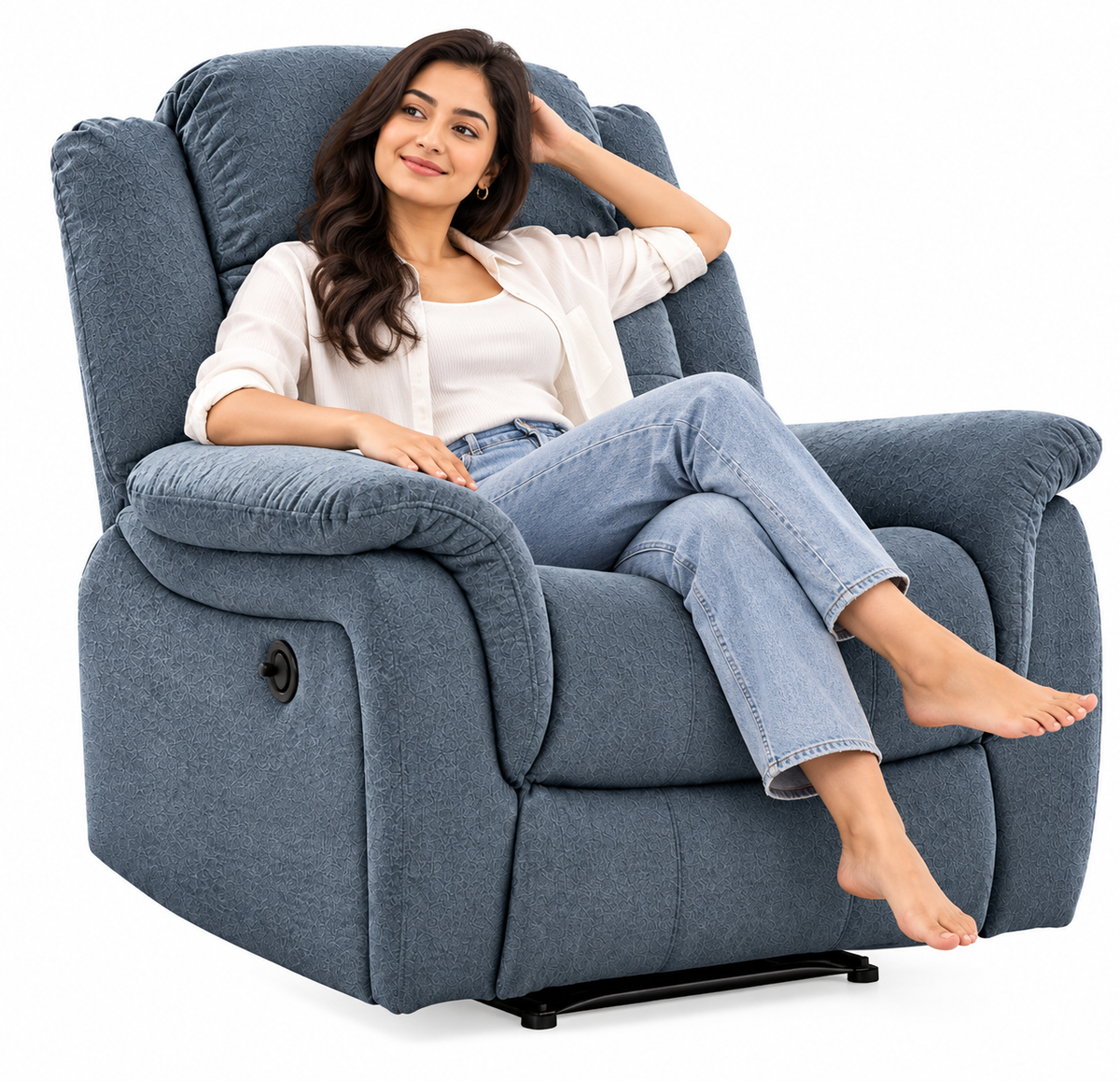 A woman reclining in a plush blue-gray upholstered armchair against a clean white background.