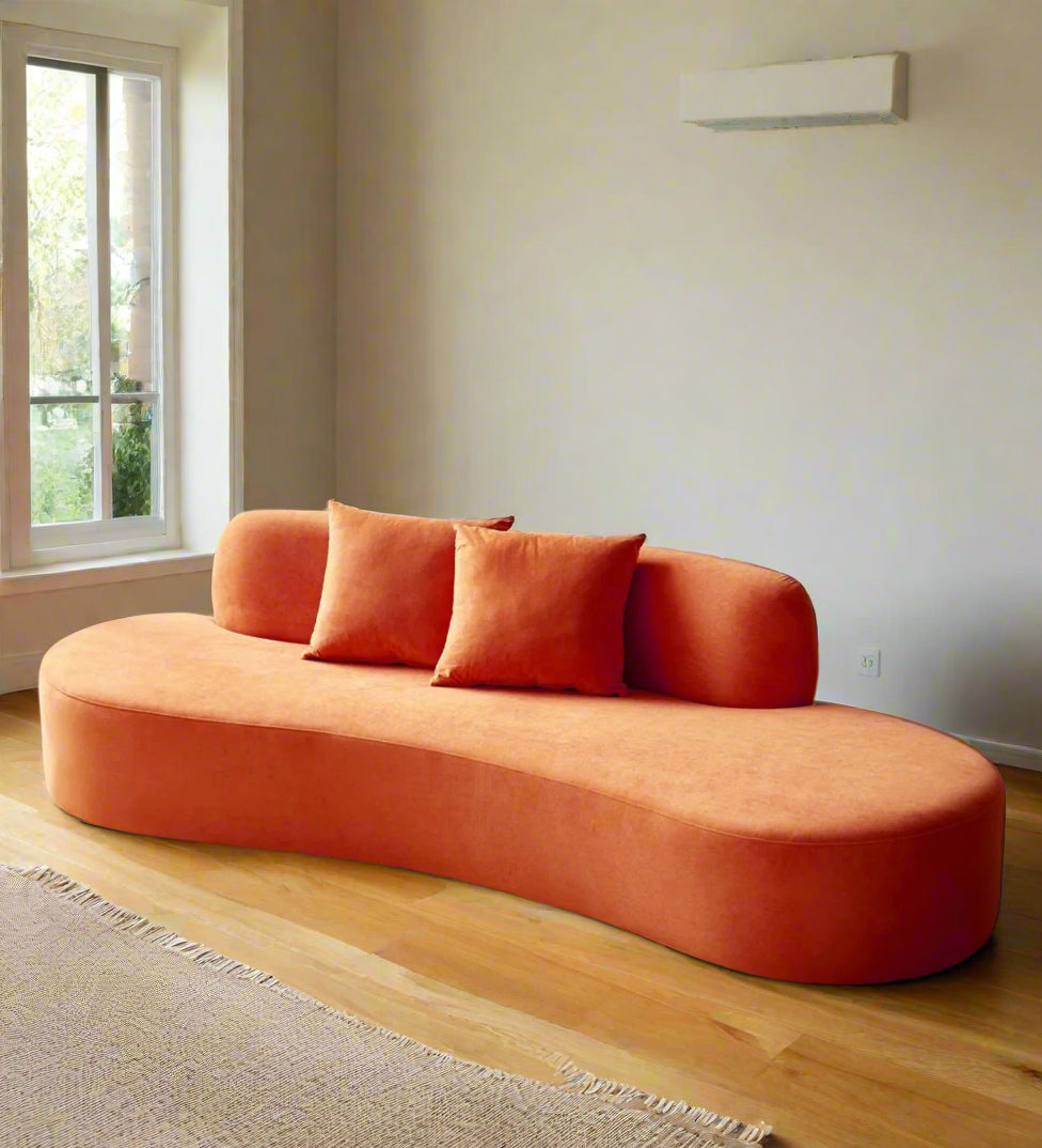 Venyl Velvet 4 Seater Curved Sofa In Yam Orange Colour
